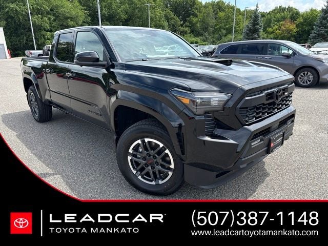 2026 Toyota Tacoma TRD Sport in Black — front three-quarter view