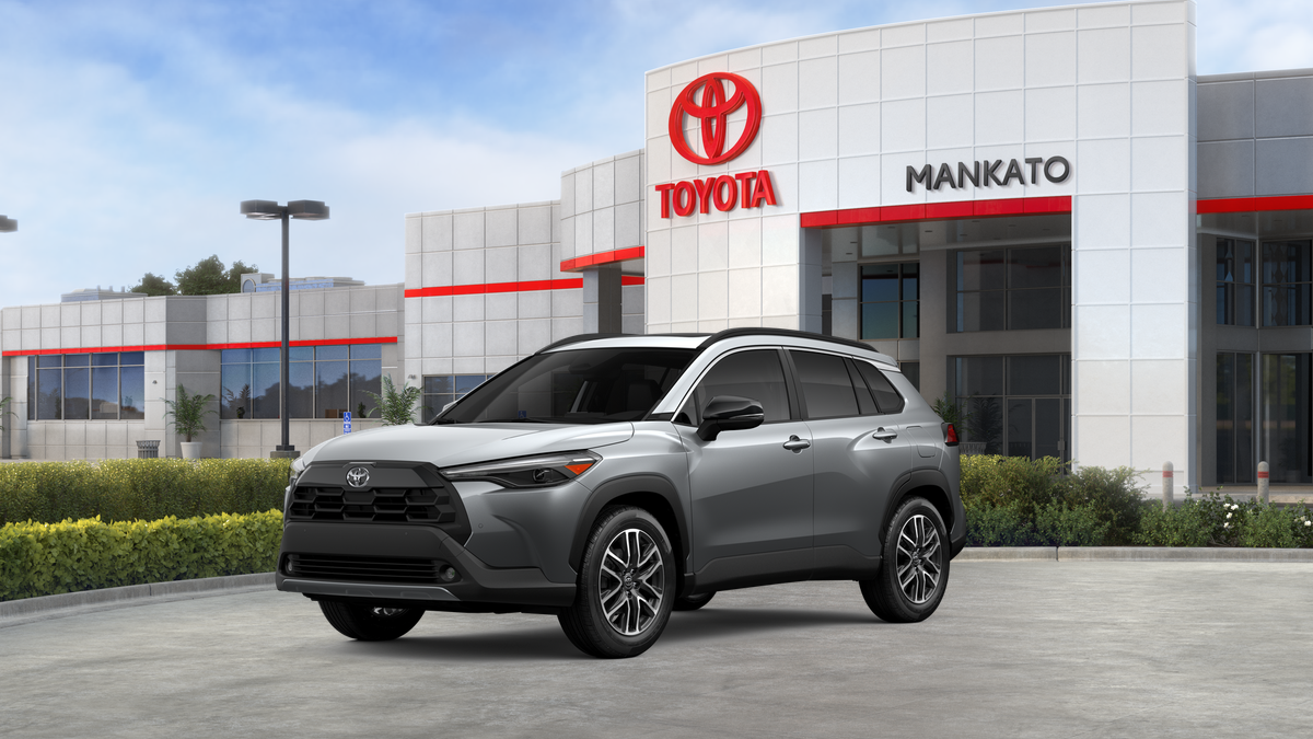 2026 Toyota Corolla Cross XLE in Sonic Silver — front three-quarter view