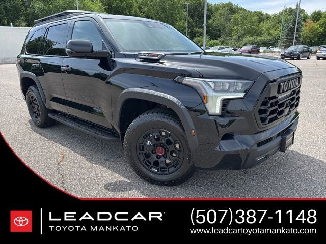 2026 Toyota Sequoia TRD Pro in Midnight Black Metallic — front three-quarter view