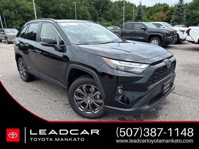 2023 Toyota RAV4 Hybrid XLE Premium in Midnight Black Metallic — front three-quarter view